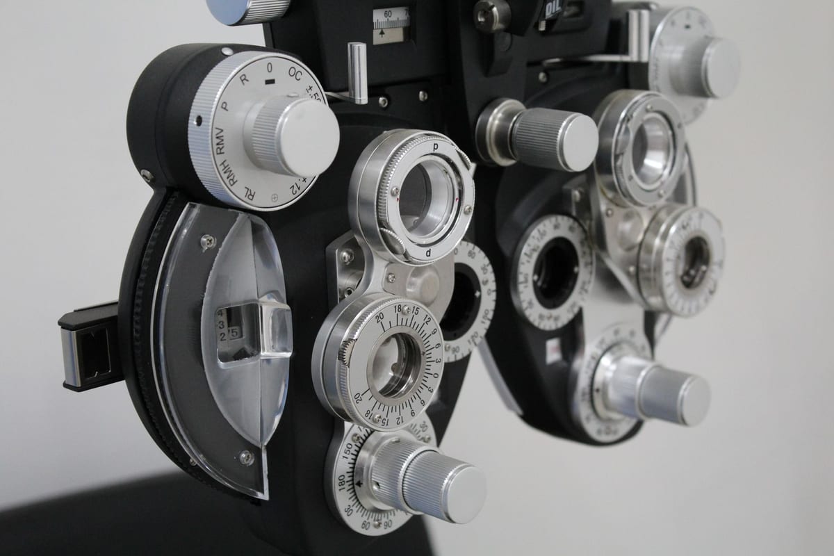Close view of a phoropter's lens dials